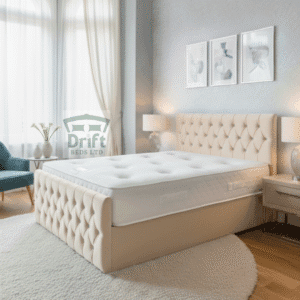 The Aspire divan bed in a classic cream velvet, demonstrating its timeless appeal and convenient side-drawer storage solution.