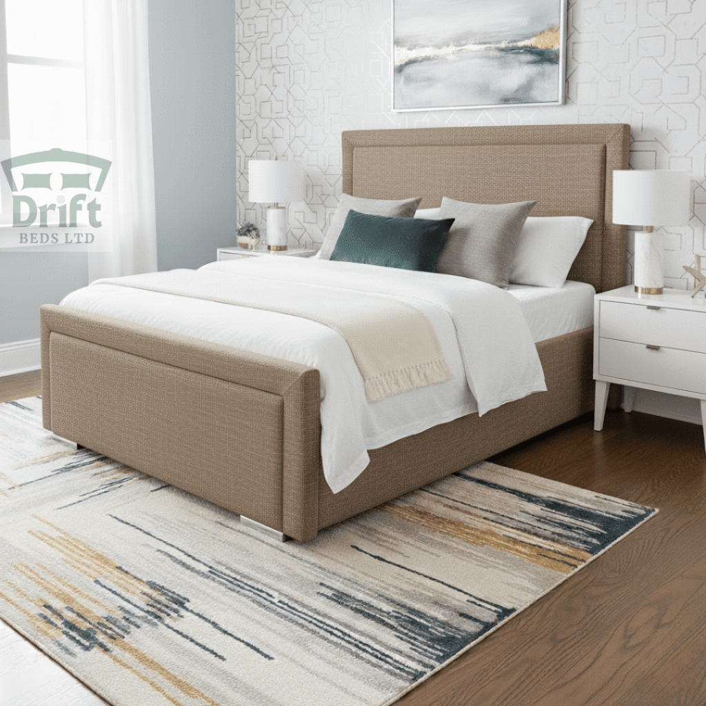 The handsome Charlie bed in a mink, highlighting its clean, tailored border and smart foot-end storage drawers.