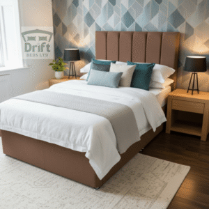 The Clarence divan bed in a classic mink finish, demonstrating its timeless appeal and convenient storage options.