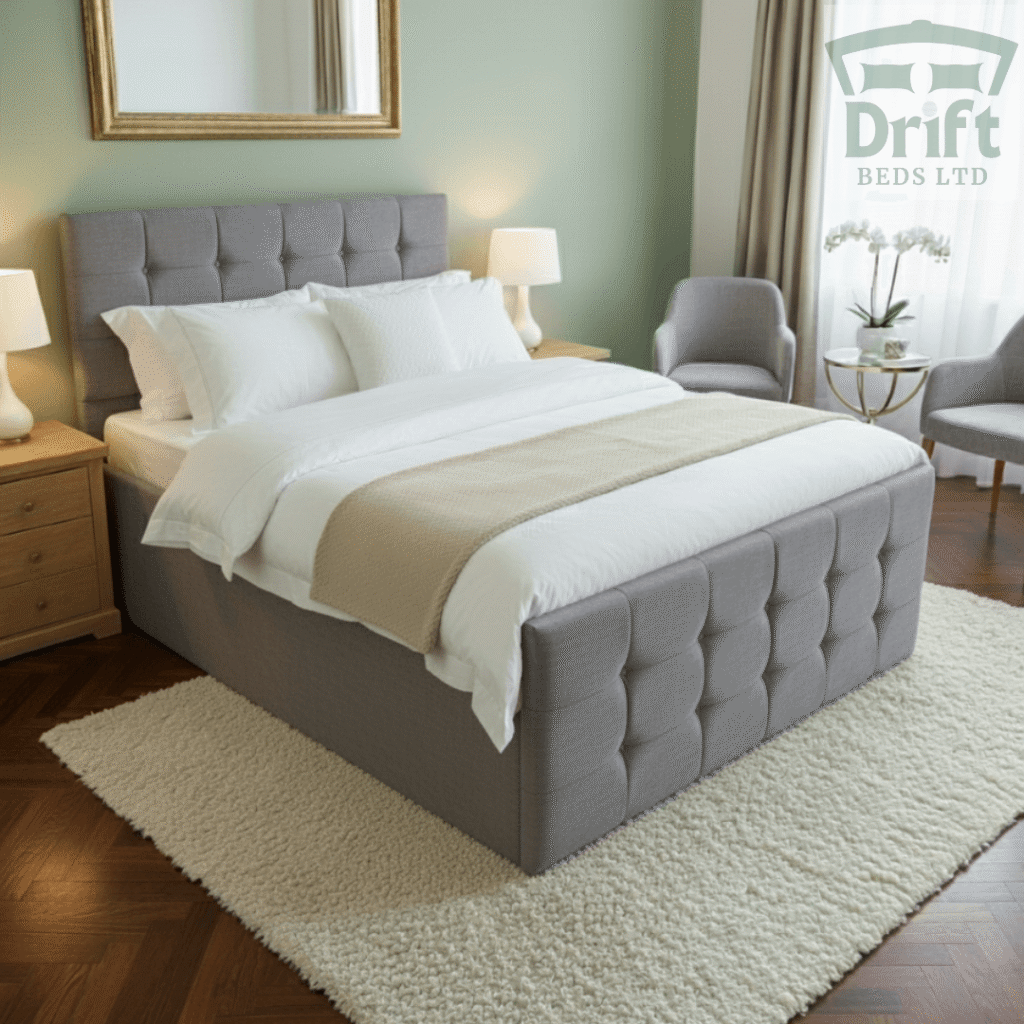 The Raven standard bed frame in a sophisticated grey fabric, with its distinctive square block tufted headboard and matching footboard, creating a modern look.