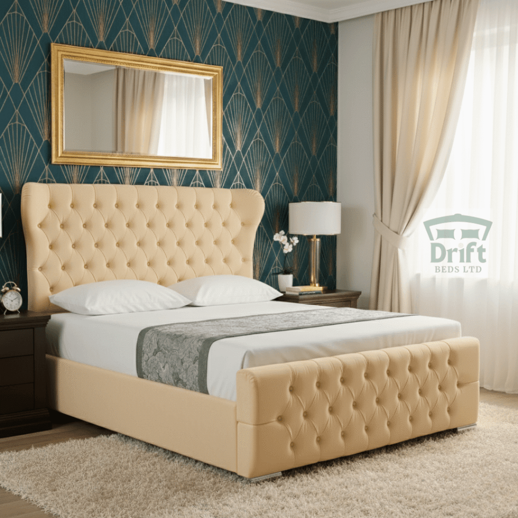 The Robin Wingback Chesterfield Cream Divan Bed Deep Button-Tufted Frame The Robin Wingback bed in a classic cream velvet, demonstrating its timeless appeal and convenient foot-end drawer solution.