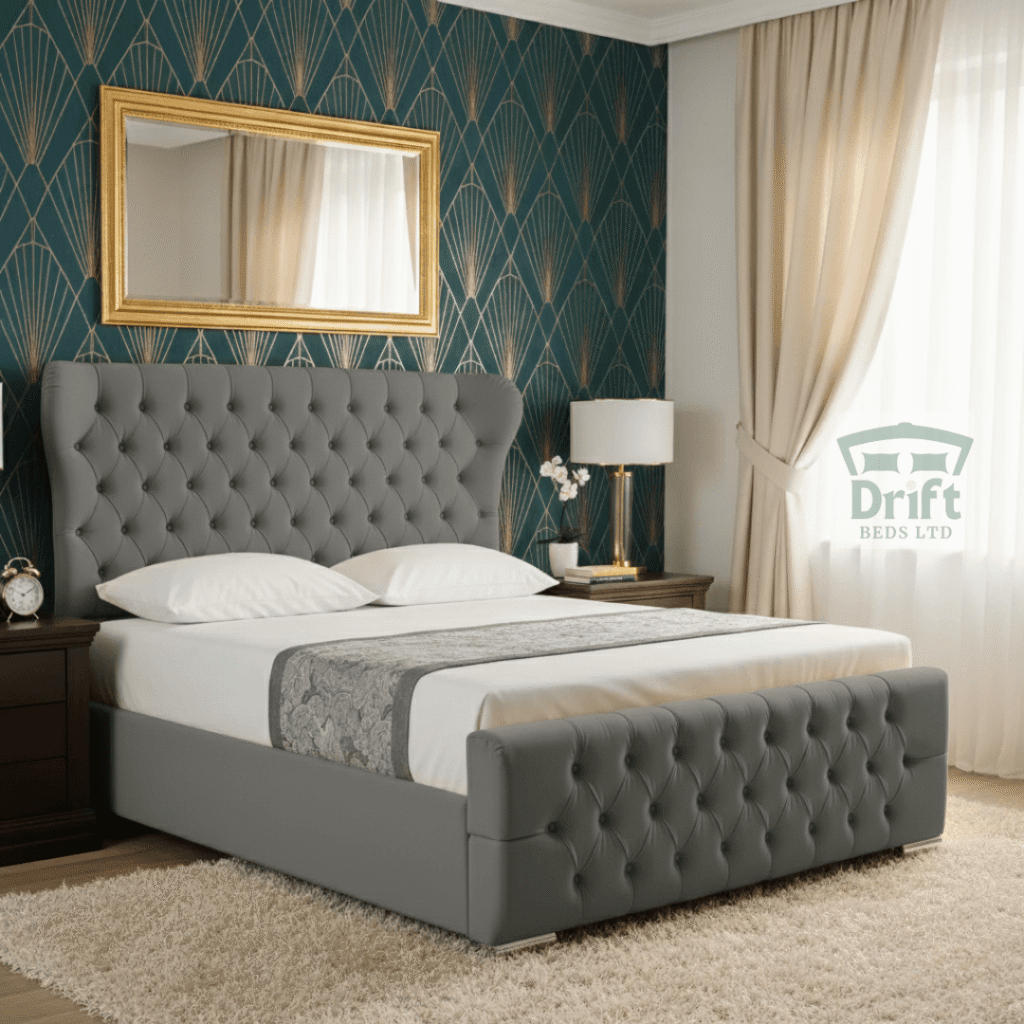 The sophisticated Robin Wingback ottoman bed in a chic grey velvet, lifted to showcase its expansive hidden storage.