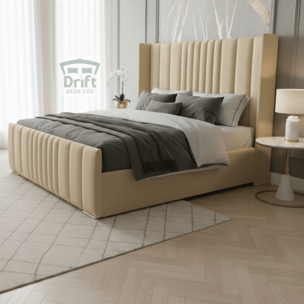 The Rome Wingback Cream Divan Bed Frame Tall Fluted Headboard The Rome Wingback divan bed in a classic cream velvet, demonstrating its grand yet elegant appeal and convenient drawer solution.