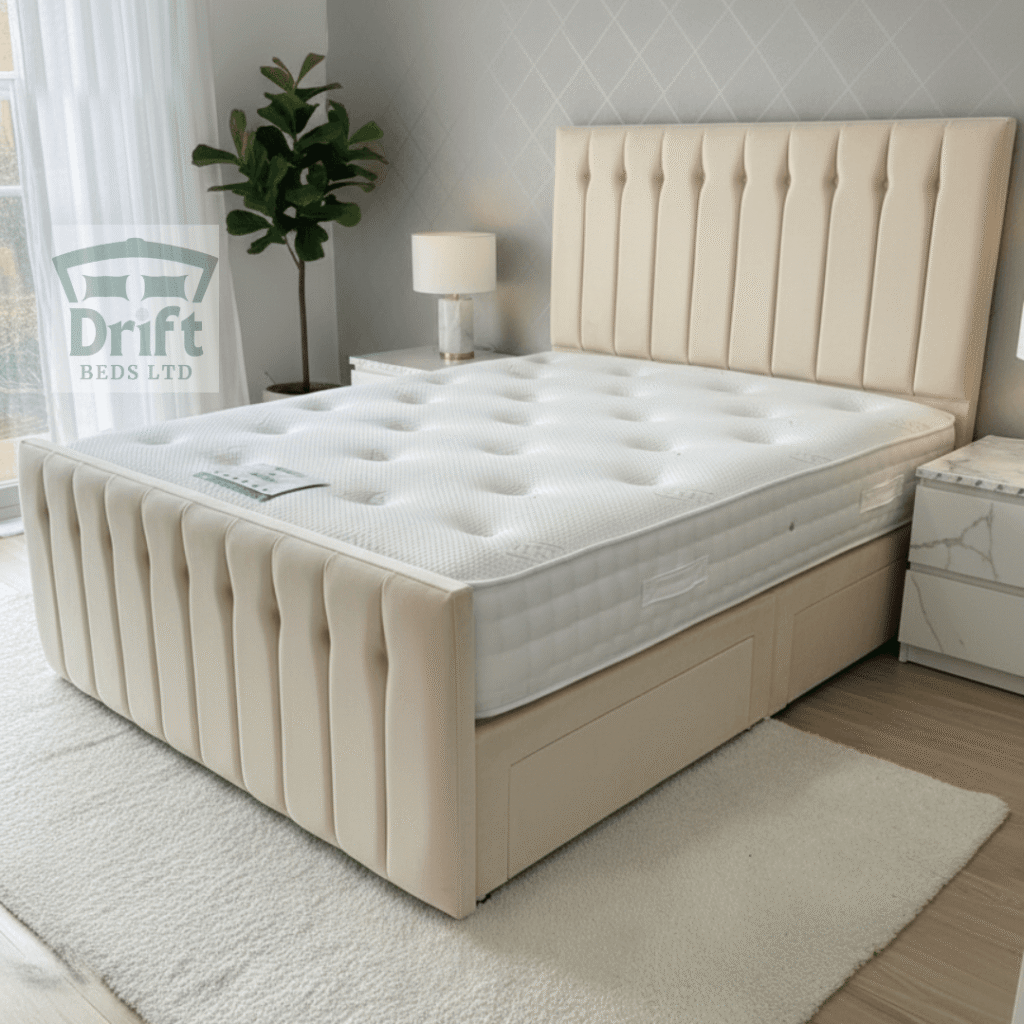 The Sparrow divan bed in a classic cream finish, showcasing its clean, minimalist design and integrated storage drawers.